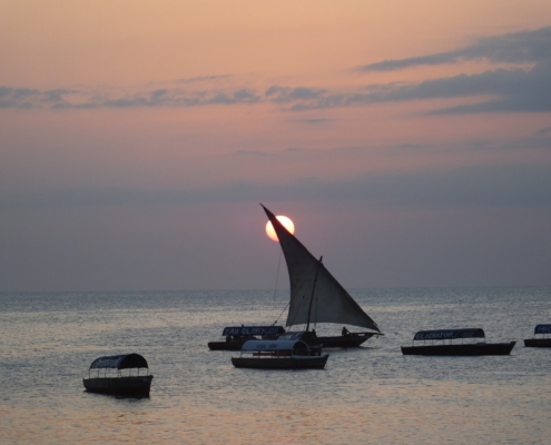 Sun setting behind a dhow (Zanzibar)